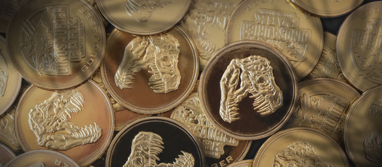 Dinopark Incentivierungsmünzen. Individuell geprägte goldene Münzen zur Belohnung für motivierte Kinder